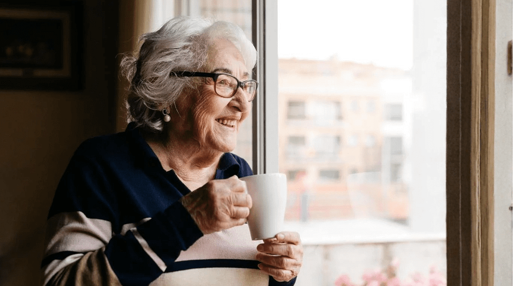 Care home activity - Lady looking from window - Wildlife for wellbeing